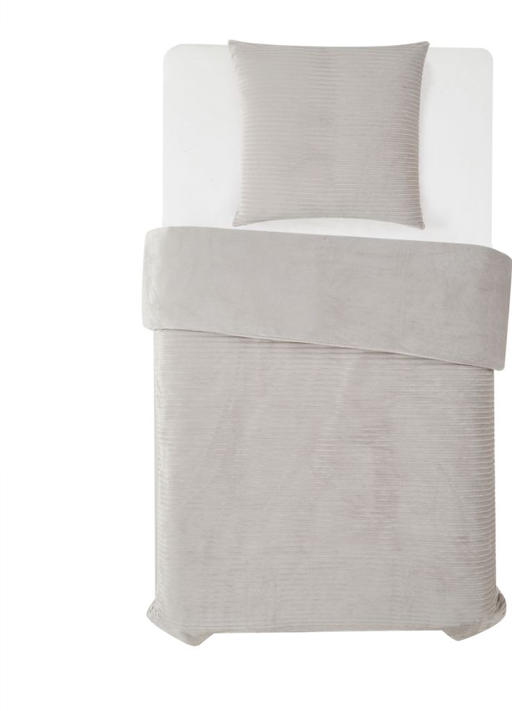 A top-down view of a bedding set on a white background.
