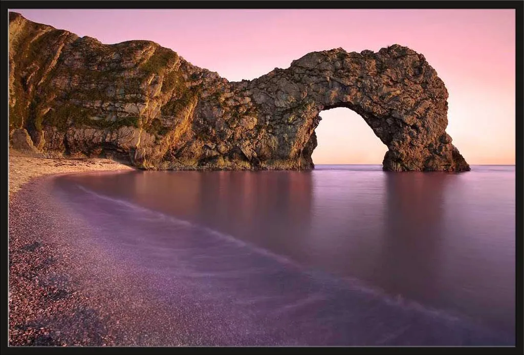 Décoration murale Durdle Door avec cadre noir et protection acrylique