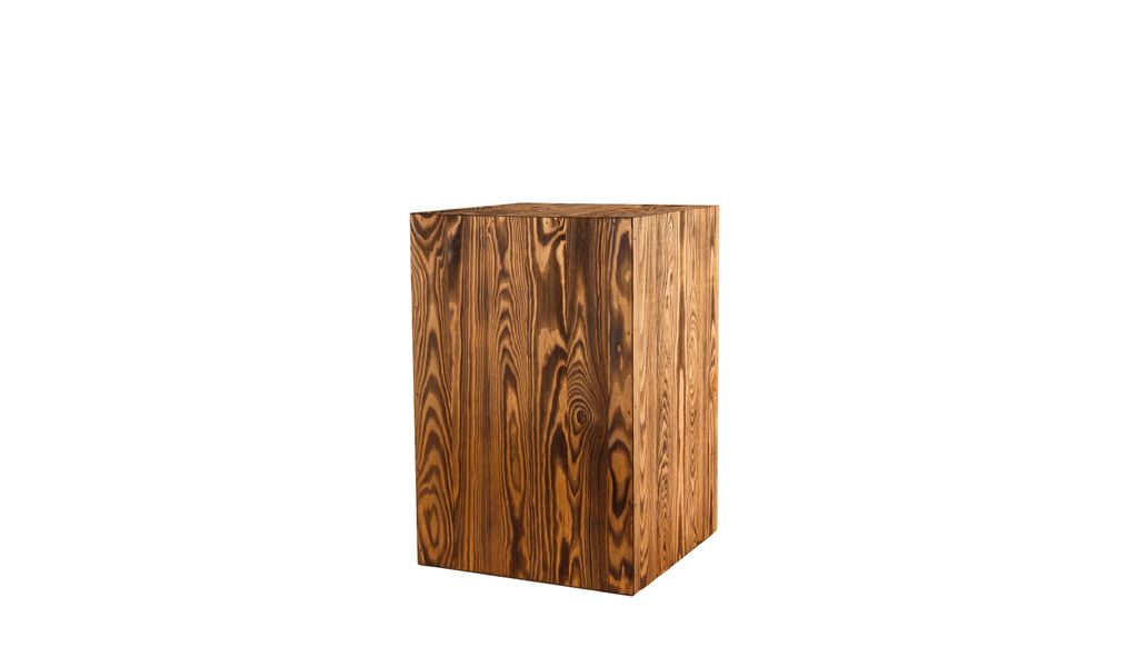 A wooden cube-shaped pedestal on a white background.