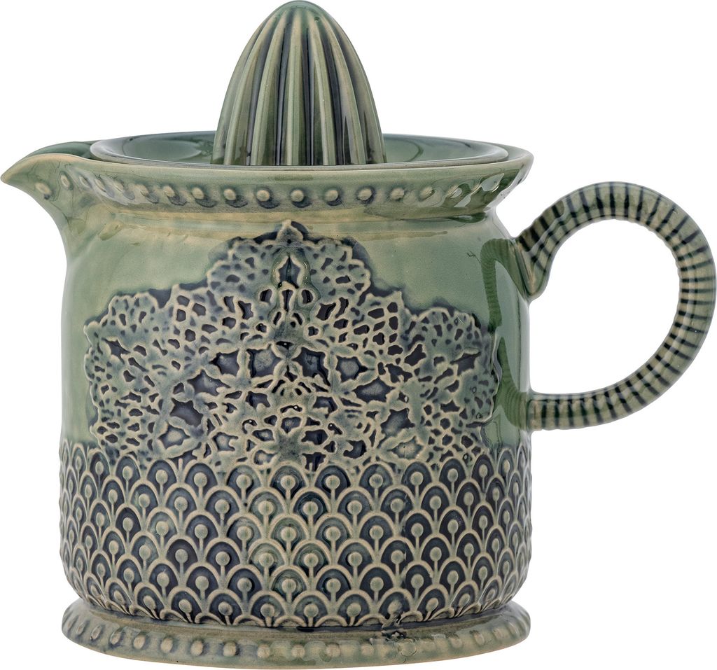 A decorative ceramic citrus juicer.