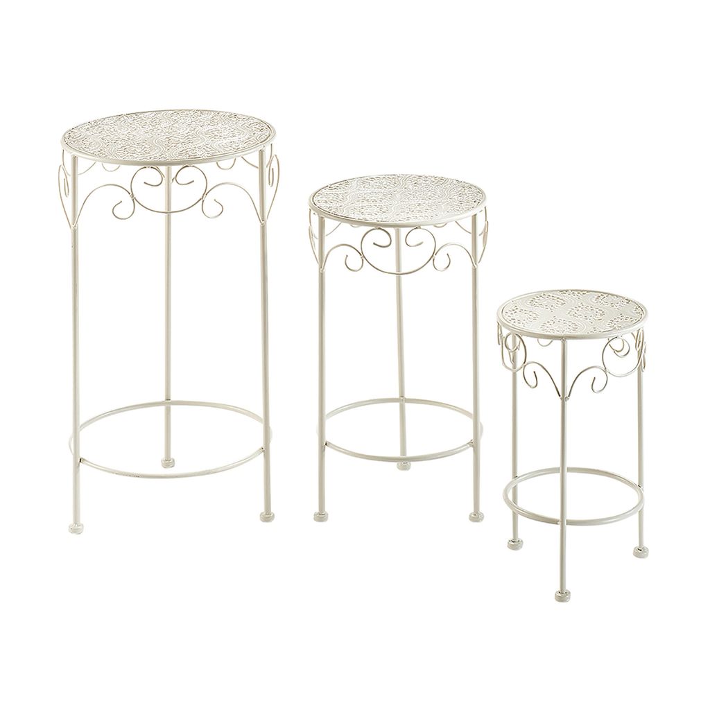 Three white metal plant stands of varying heights are arranged on a white background.