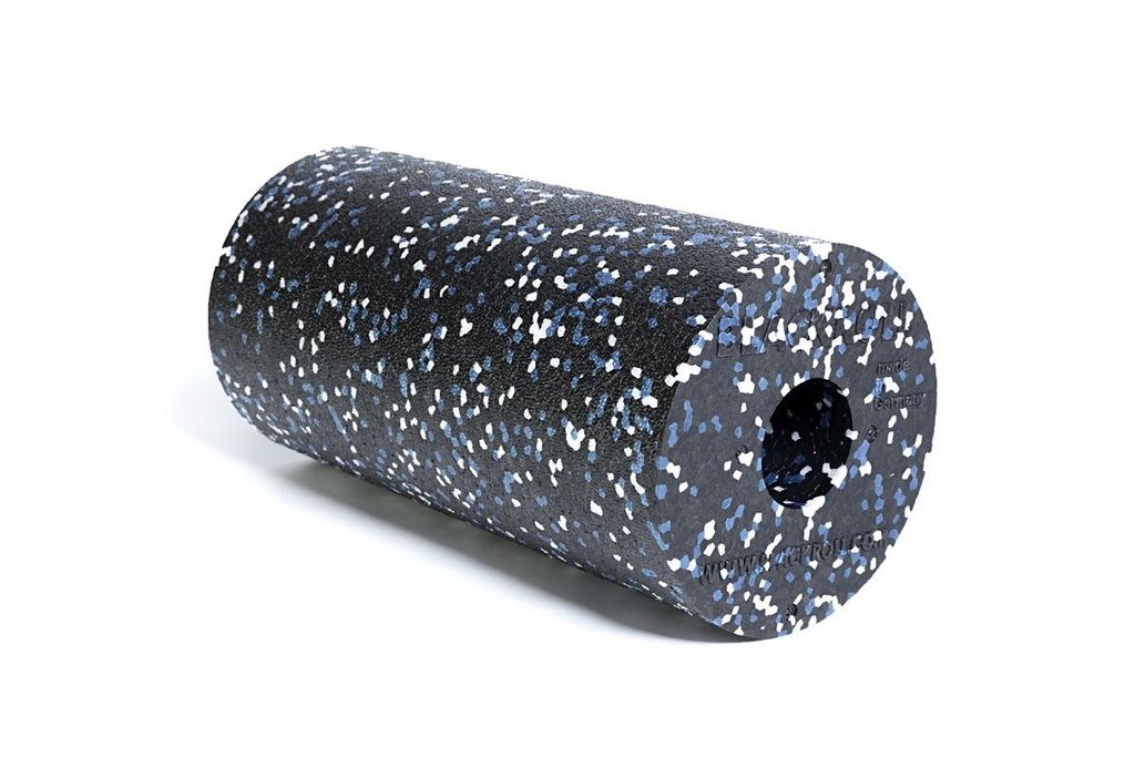A black foam roller with blue and white speckles, shown on a white background.