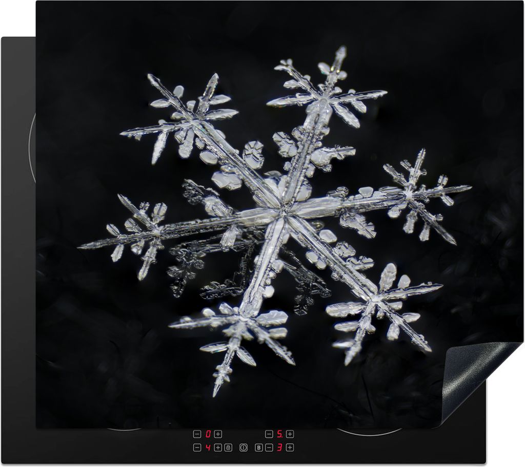 KitchenYeah Herdabdeckplatte Gefrorene Schneeflocke mit Reflexion in Schwarz und Weiß , 59x51cm, Küche Deko, Glaskeramikfeld Herdabdeckung, Abd...