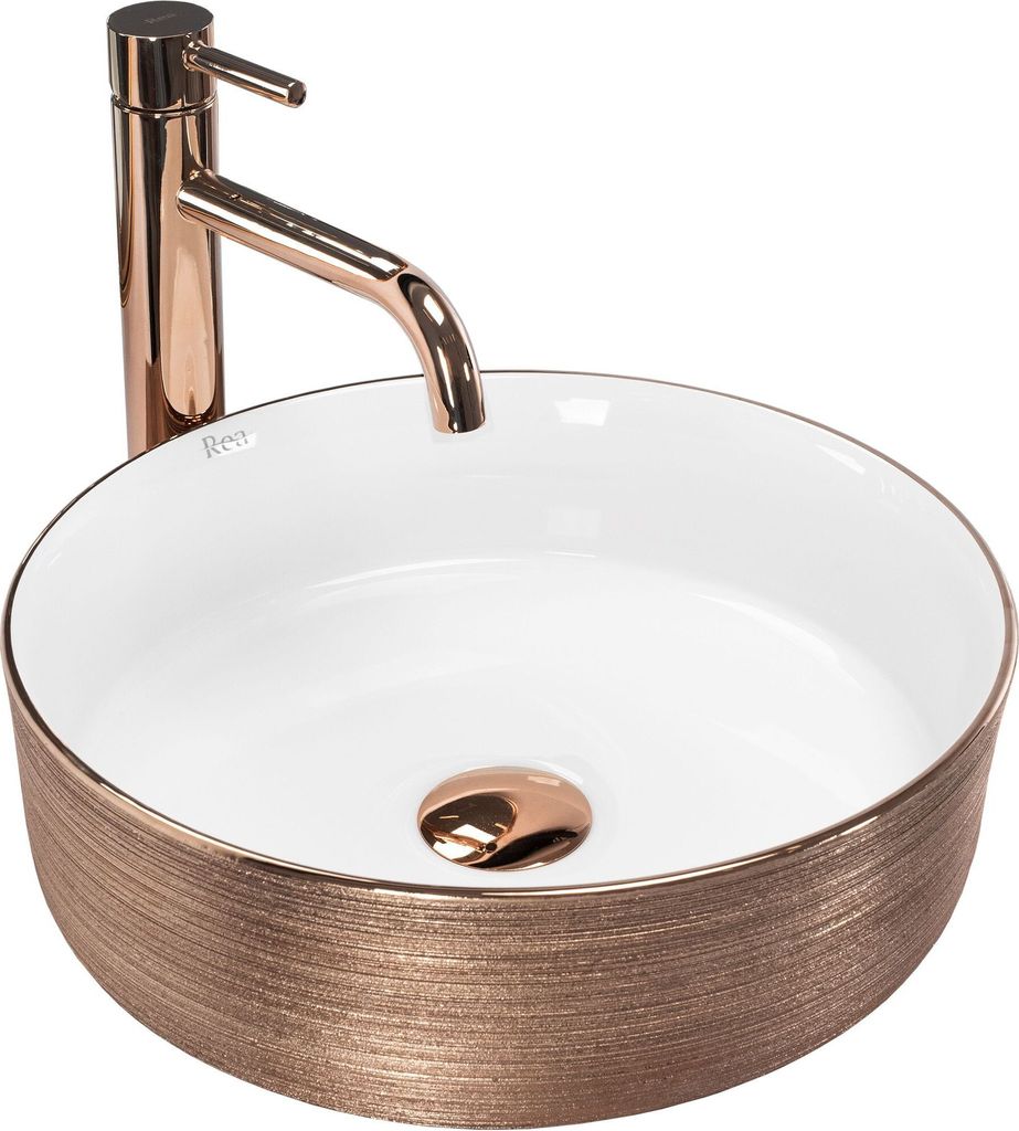 A rose gold and white basin with a rose gold faucet, presented against a white background.