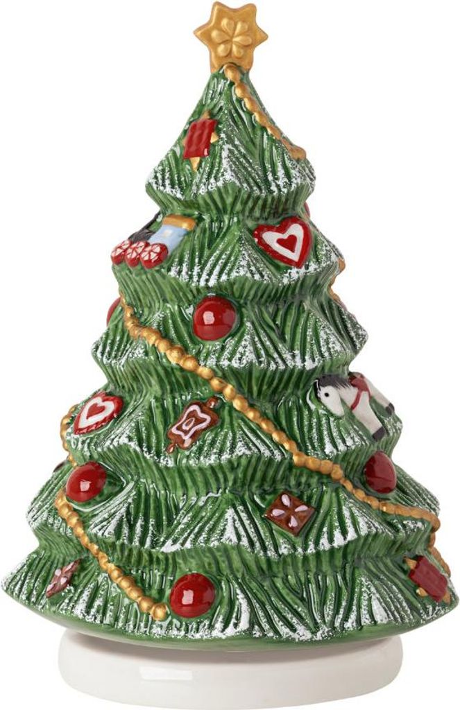A ceramic Christmas tree figurine decorated with ornaments and garland, standing on a white base.