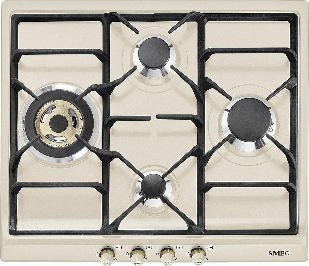 A top-down view of a cream-colored gas stovetop with black grates and burners.