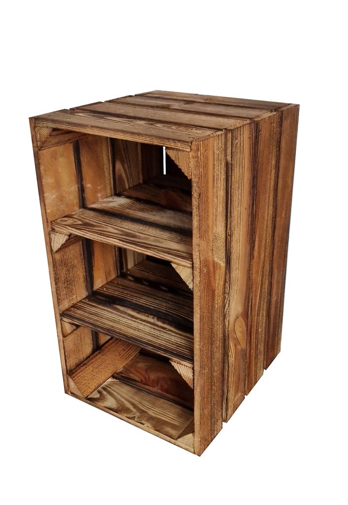 A wooden shelving unit made of crates, standing on a white background.