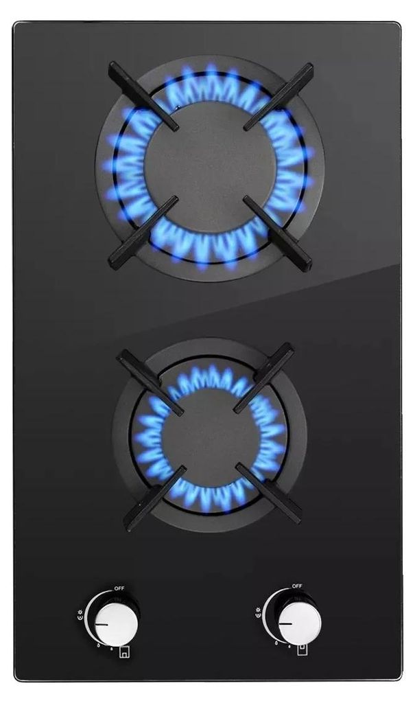 A top-down view of a black gas stovetop with two burners on, showing blue flames.