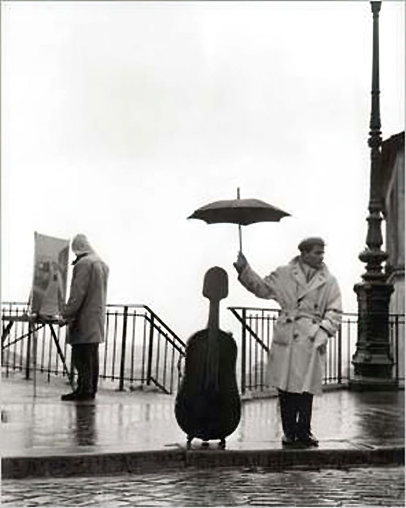 Ein Musiker im Regen Kunstdruck Robert Doisneau 24 x 30 cm