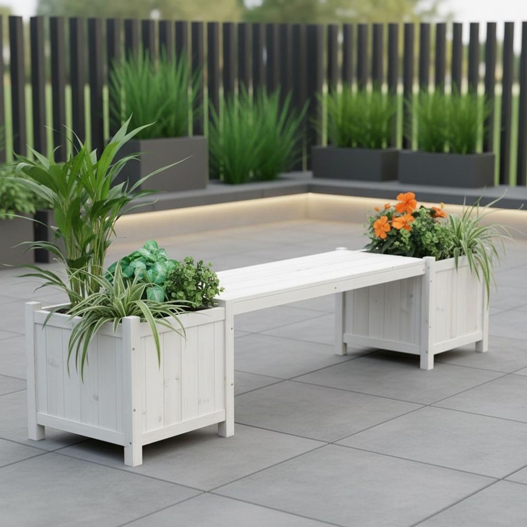 A white wooden garden bench with integrated planters on a paved patio, with a dark fence and greenery in the background.