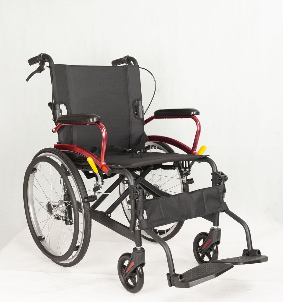 A studio shot of a wheelchair against a white background.