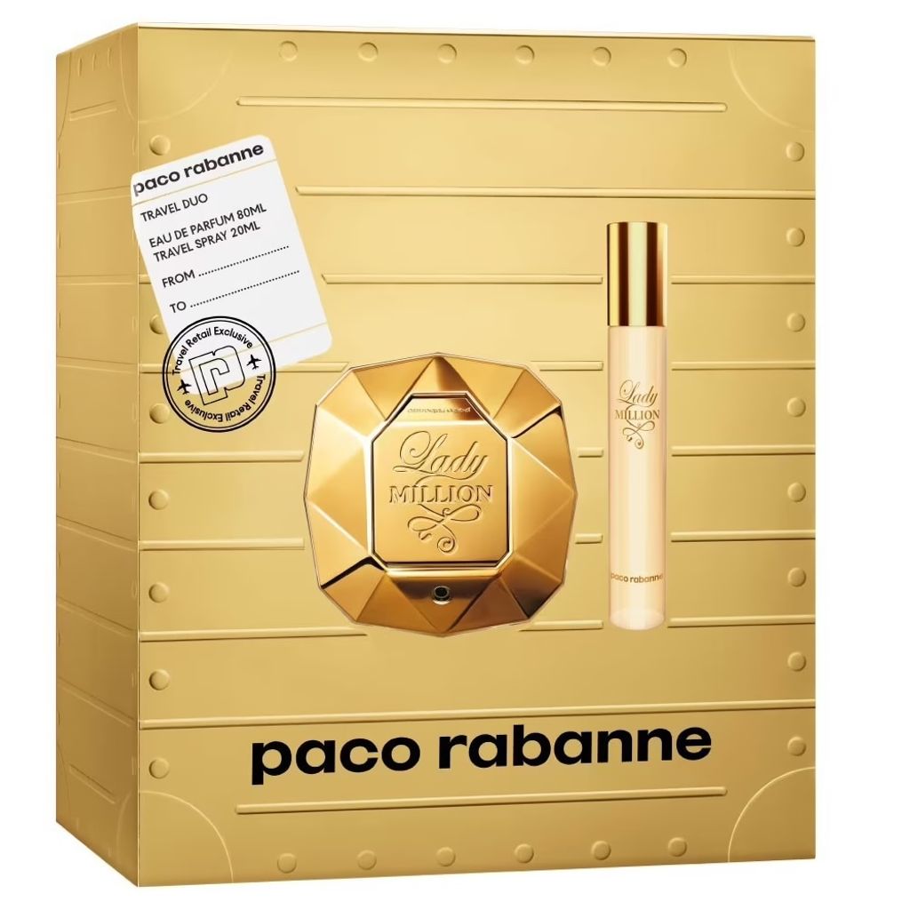 A gold-colored gift set box for Paco Rabanne Lady Million perfume, featuring the perfume bottle and a travel spray.