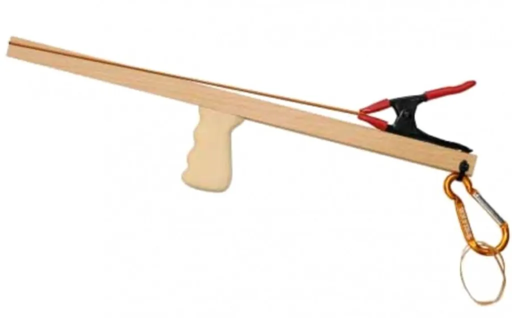Cliquet réversible gainé de caoutchouc souple pour mécanique de vélo