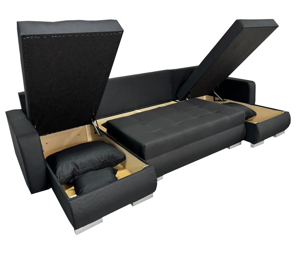 A black U-shaped sectional sofa with its storage compartments open, revealing cushions inside.