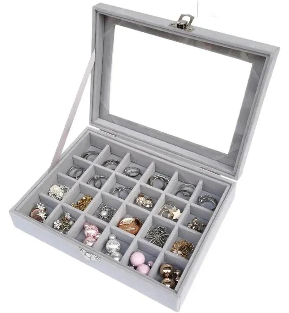 Boîte à bijoux grise avec design compact et aspect élégant raffiné