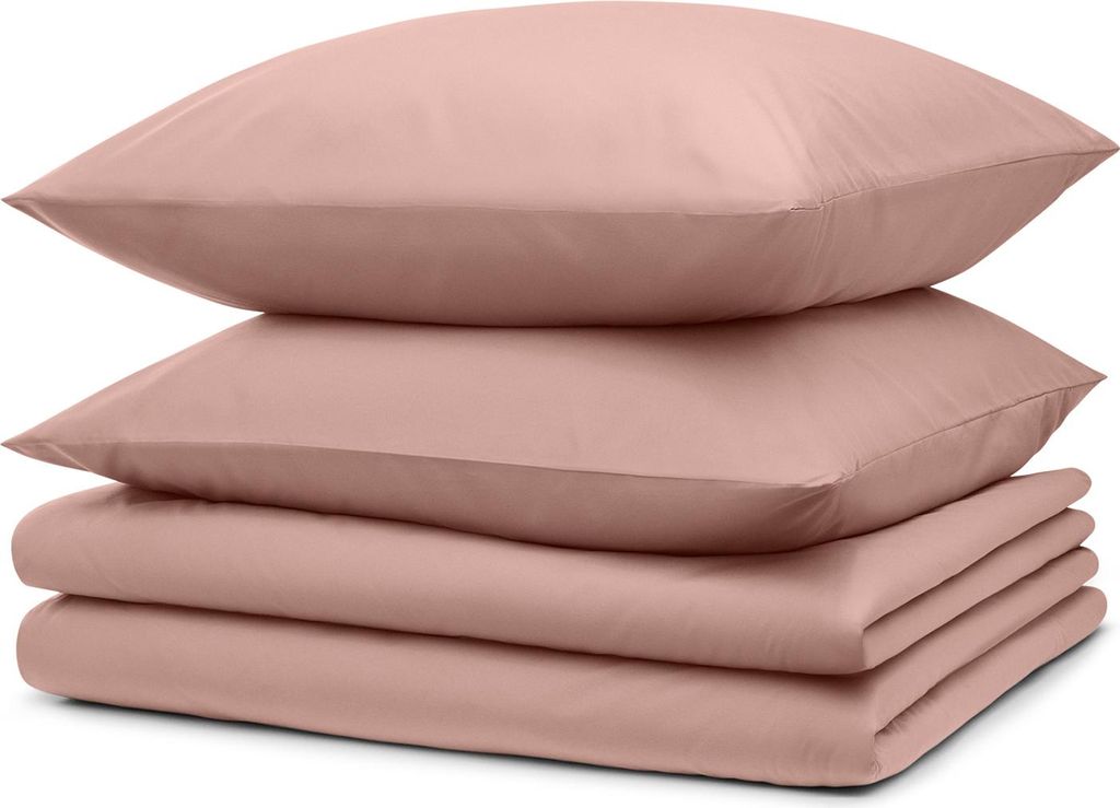 A stack of folded bedding and pillows.