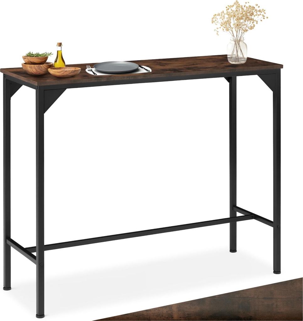 A high bar table with a dark wood top and black metal legs, set against a white background. Small decorative items are placed on the table.