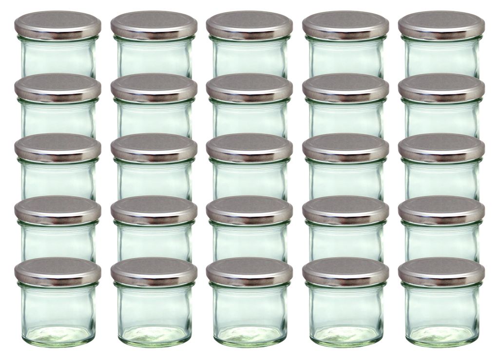 A grid of identical glass jars with silver lids.