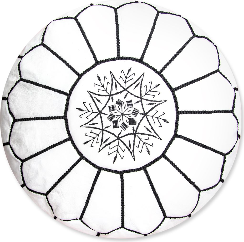 A white and black Moroccan leather pouf with intricate embroidery.