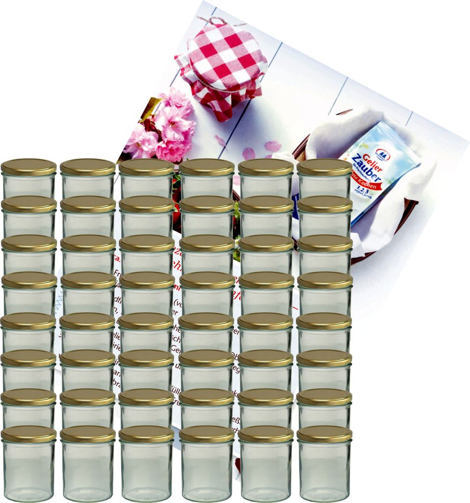 A large stack of small glass jars with gold lids, with a decorative checkered lid and flowers in the background.