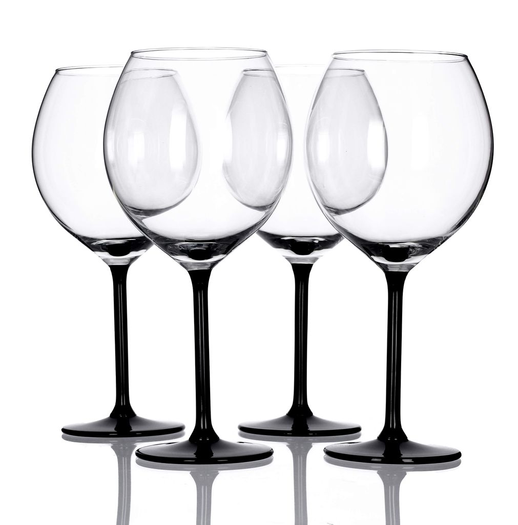 Four clear wine glasses with black stems and bases are arranged in a row against a white background.