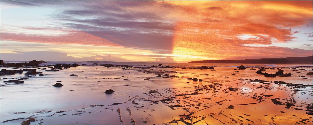 Wallario Poster - Wattwanderung am Meer bei Sonnenuntergang, Kunstdruck Größe: 80 x 200 cm