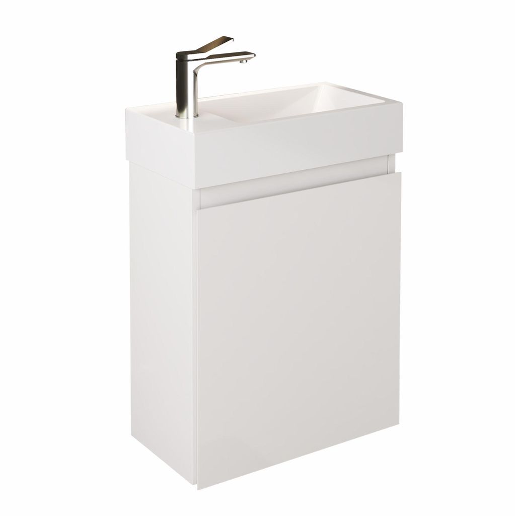 A white bathroom vanity with a sink and faucet against a white background.
