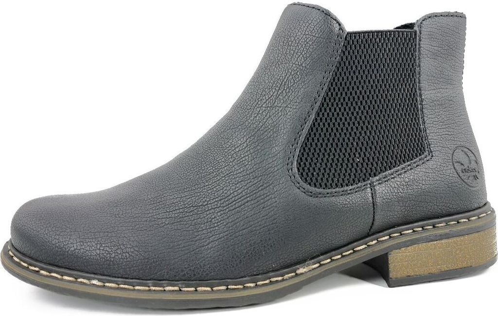 A side view of a black Chelsea boot.