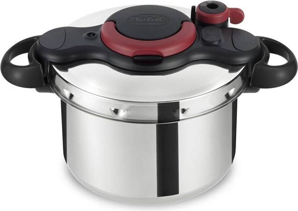 A stainless steel pressure cooker with a black and red lid and handles, shown from a slightly elevated front-side angle on a white background.