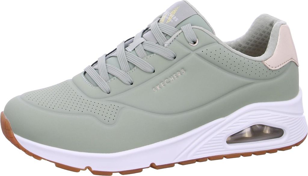 A side view of a single green Skechers sneaker.