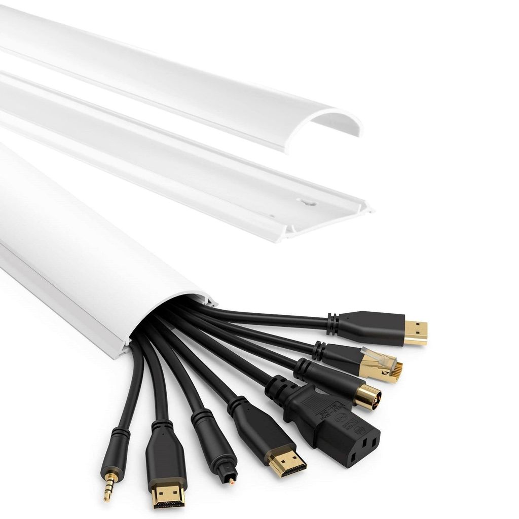 A white PVC cable management channel with various cables emerging from it, shown with a separate, disassembled piece of the channel above.