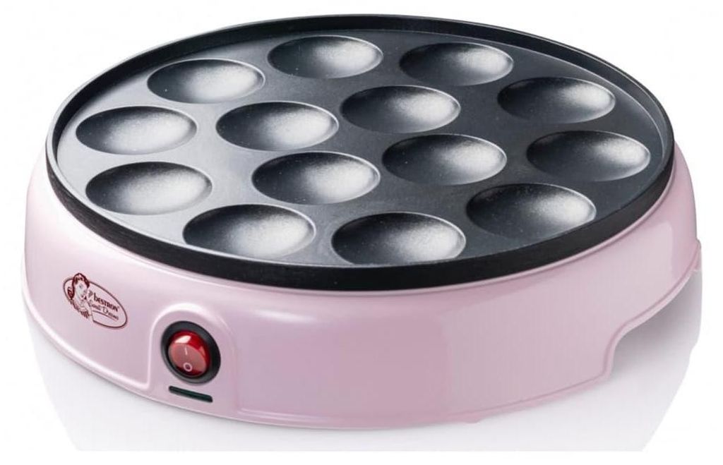A pink poffertjes maker with a black cooking plate and a red on/off switch.