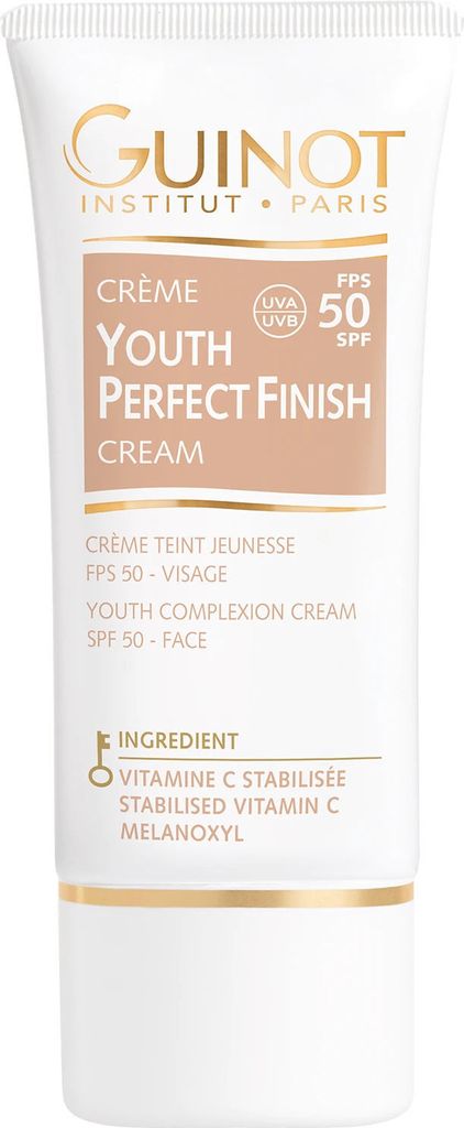 A white tube of GUINOT Crème Youth Perfect Finish cream with gold accents and text.
