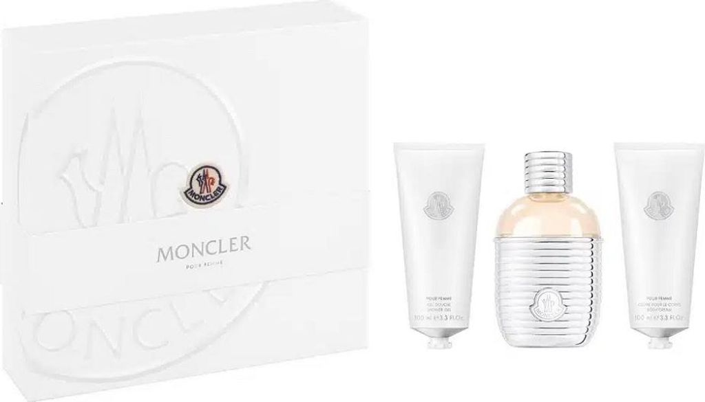 A white gift box containing Moncler fragrance products.