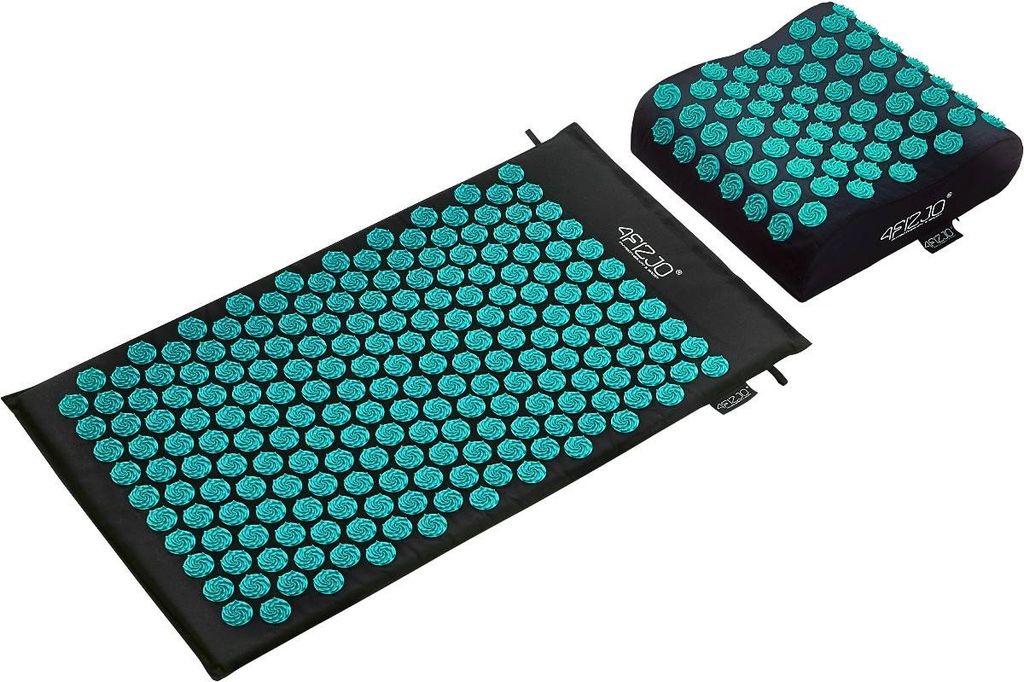 A black acupressure mat and pillow with teal spikes are displayed on a white background.