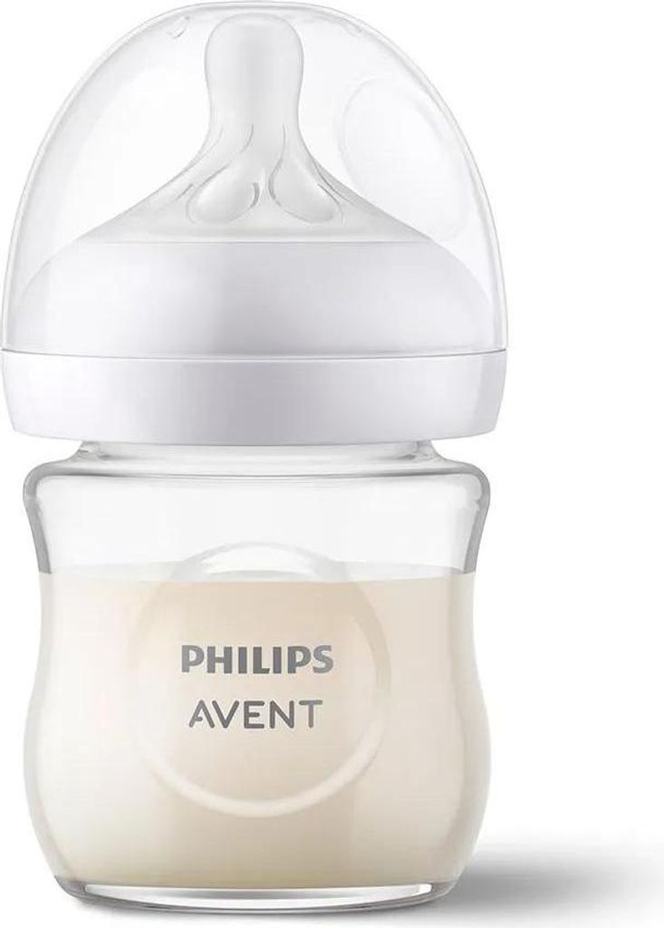 A Philips Avent baby bottle filled with milk, shown against a white background.