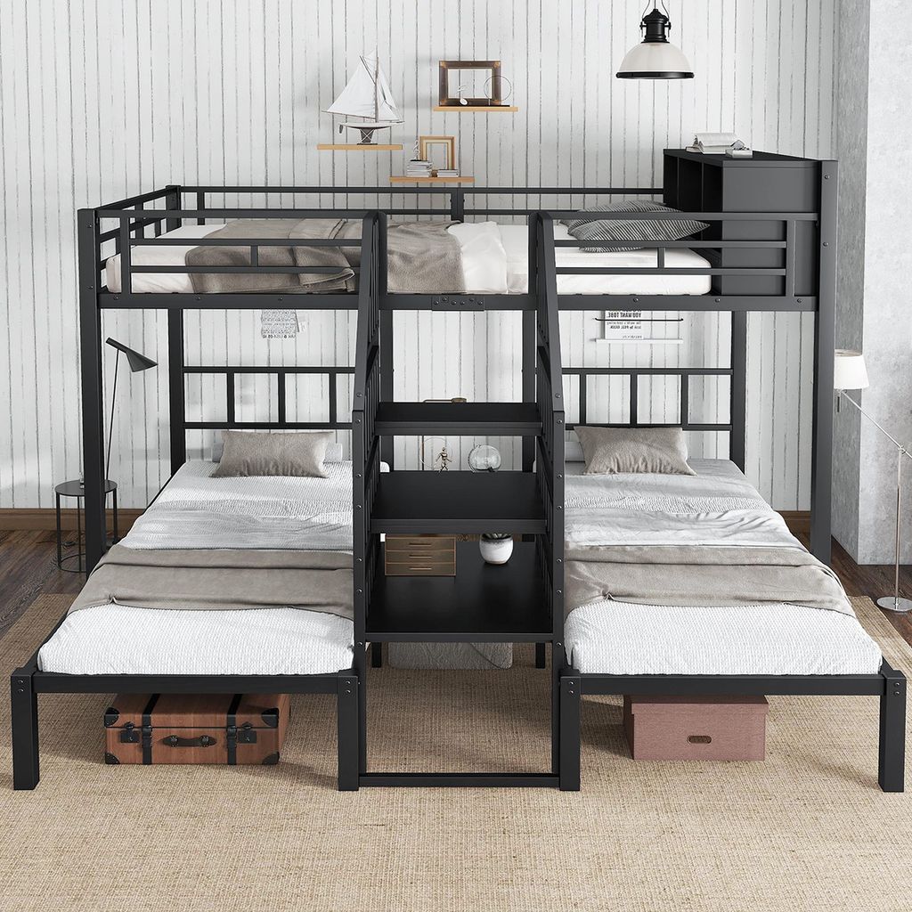 A black metal bunk bed with three beds, a ladder, and storage shelves, set against a white paneled wall.