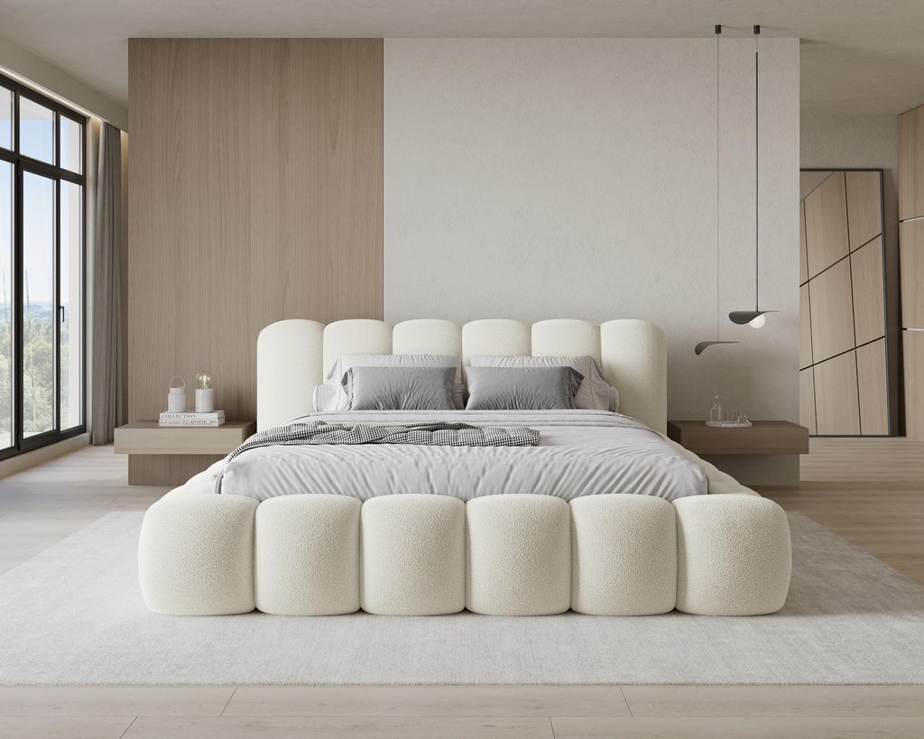 A modern bedroom with a large bed.