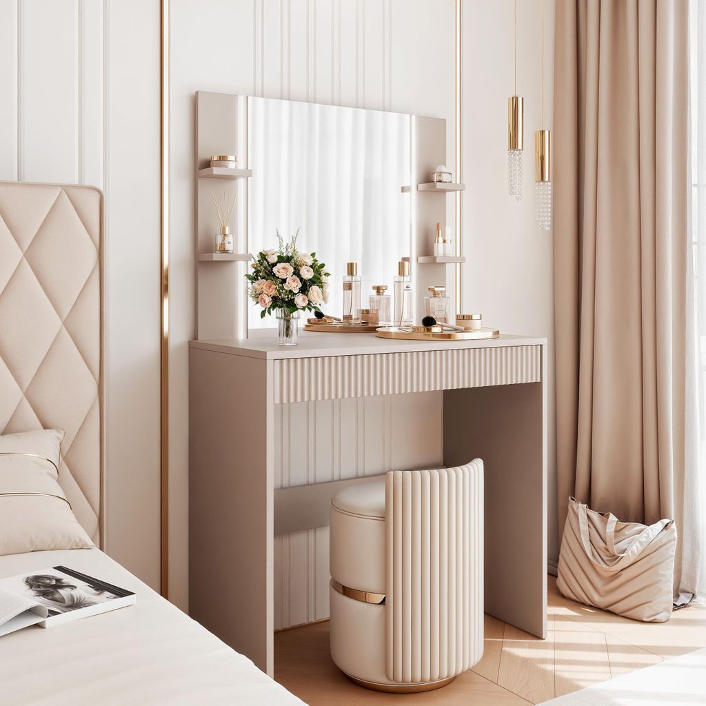 A vanity table set in a bedroom with soft lighting and decor.