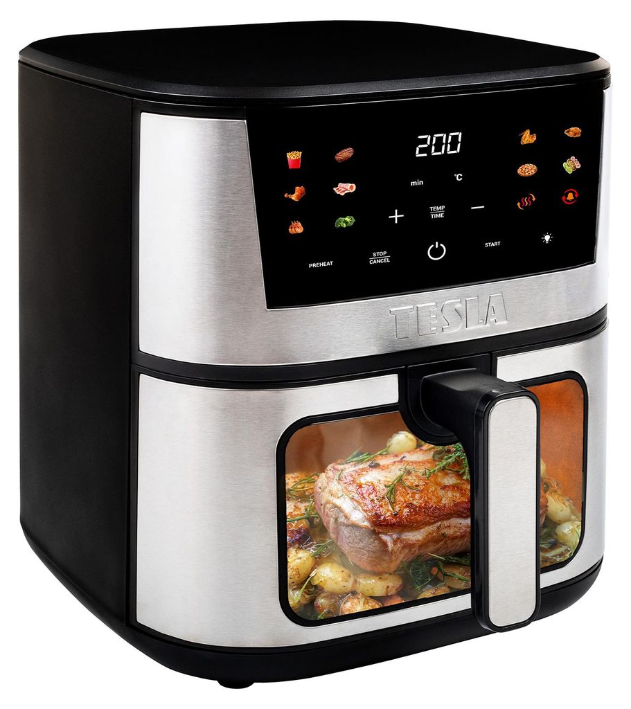 A Tesla AirCook Q60 XXL Pro digital air fryer is shown from a front-side angle. The air fryer has a digital display panel with various food icons and temperature settings. Inside the transparent window, a roasted chicken with herbs and potatoes is visible.