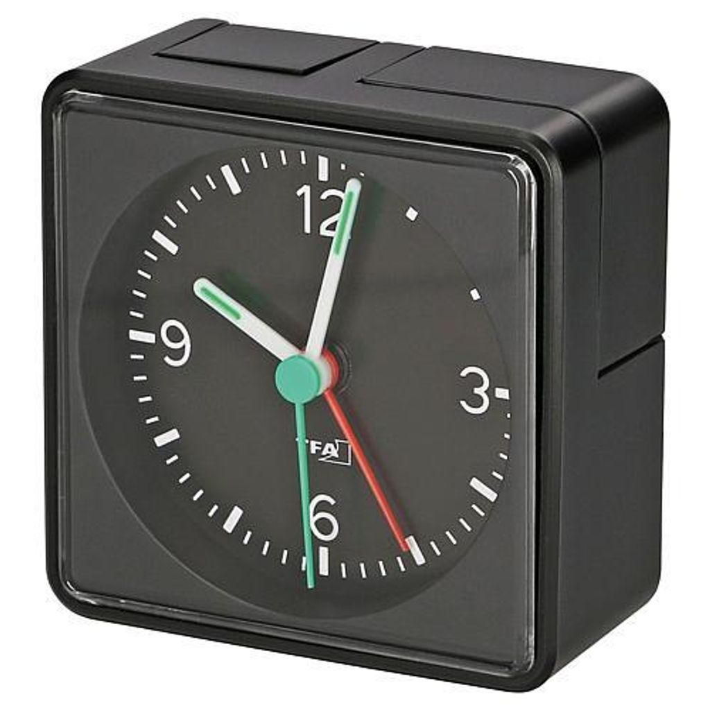 A black TFA electronic alarm clock with a white face and black numbers.