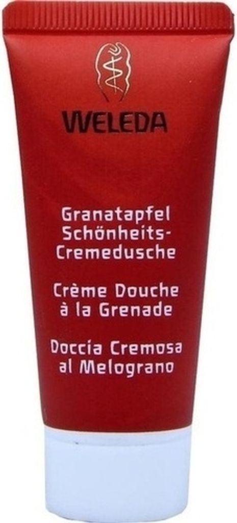 A red tube of Weleda shower cream with white text and a white cap.