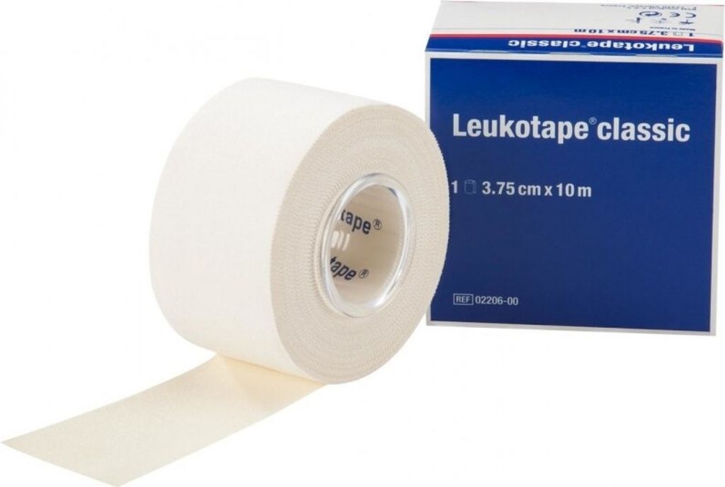 A roll of white medical tape and its blue packaging are shown against a white background.