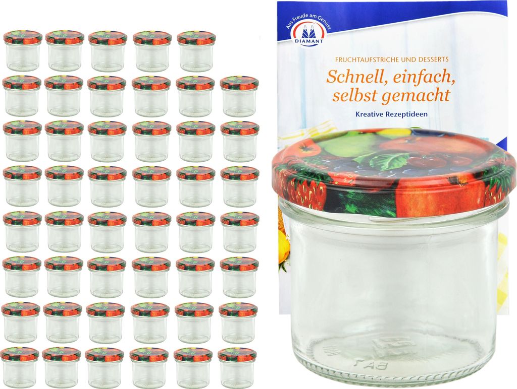 A set of small glass jars with decorative lids and a recipe book.