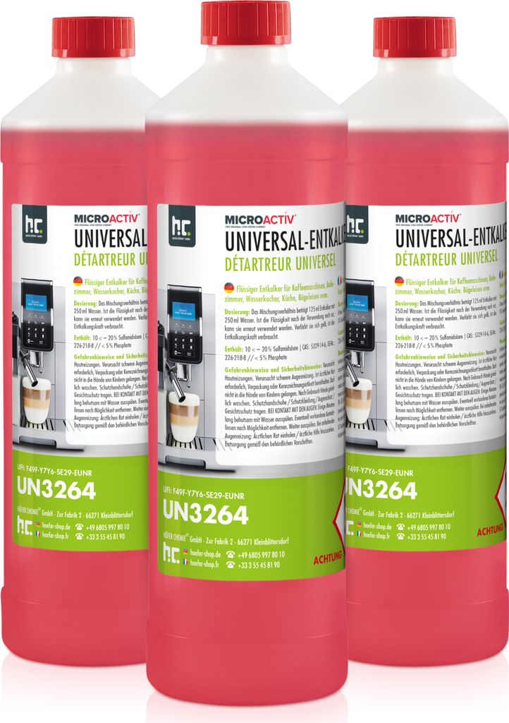 Three bottles of red liquid cleaning solution for coffee machines.
