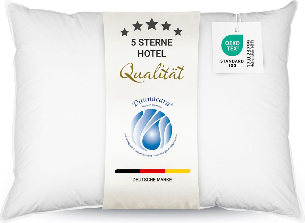 A white pillow with a label attached, featuring product information and certifications.