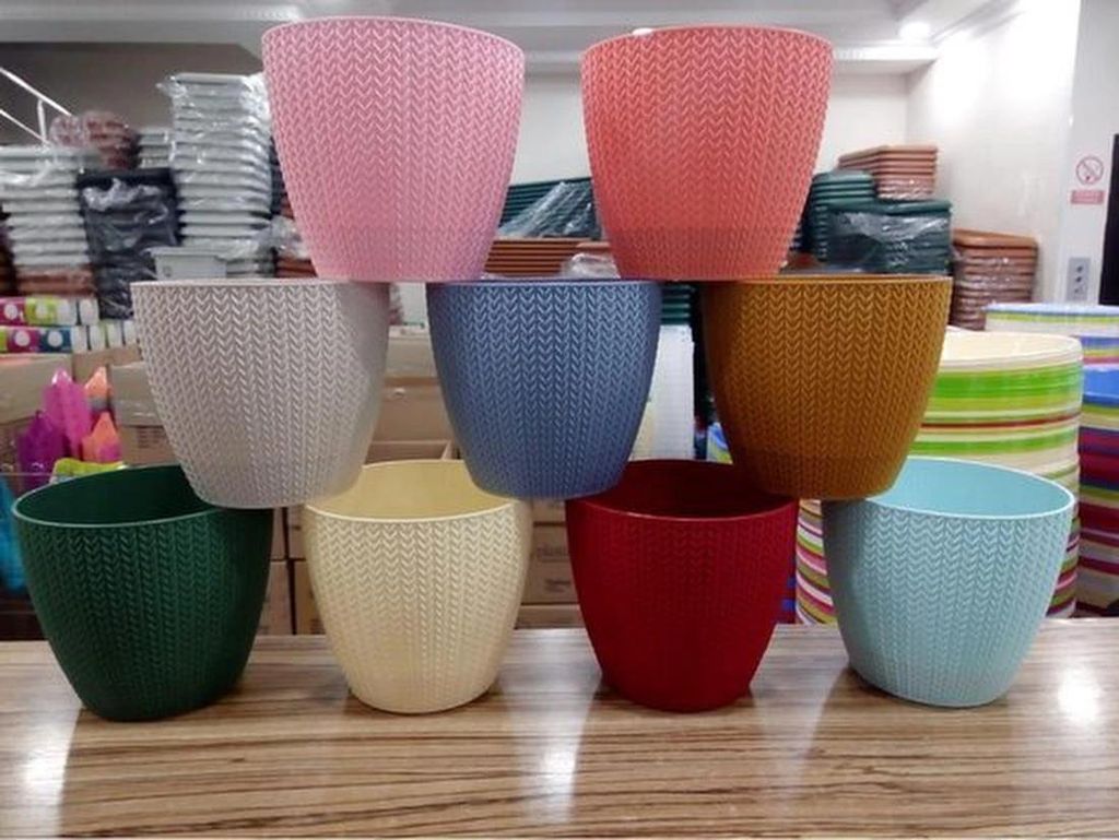 Sumela Smartpot Set mit 7 bunten Blumentöpfen und Produktbild 