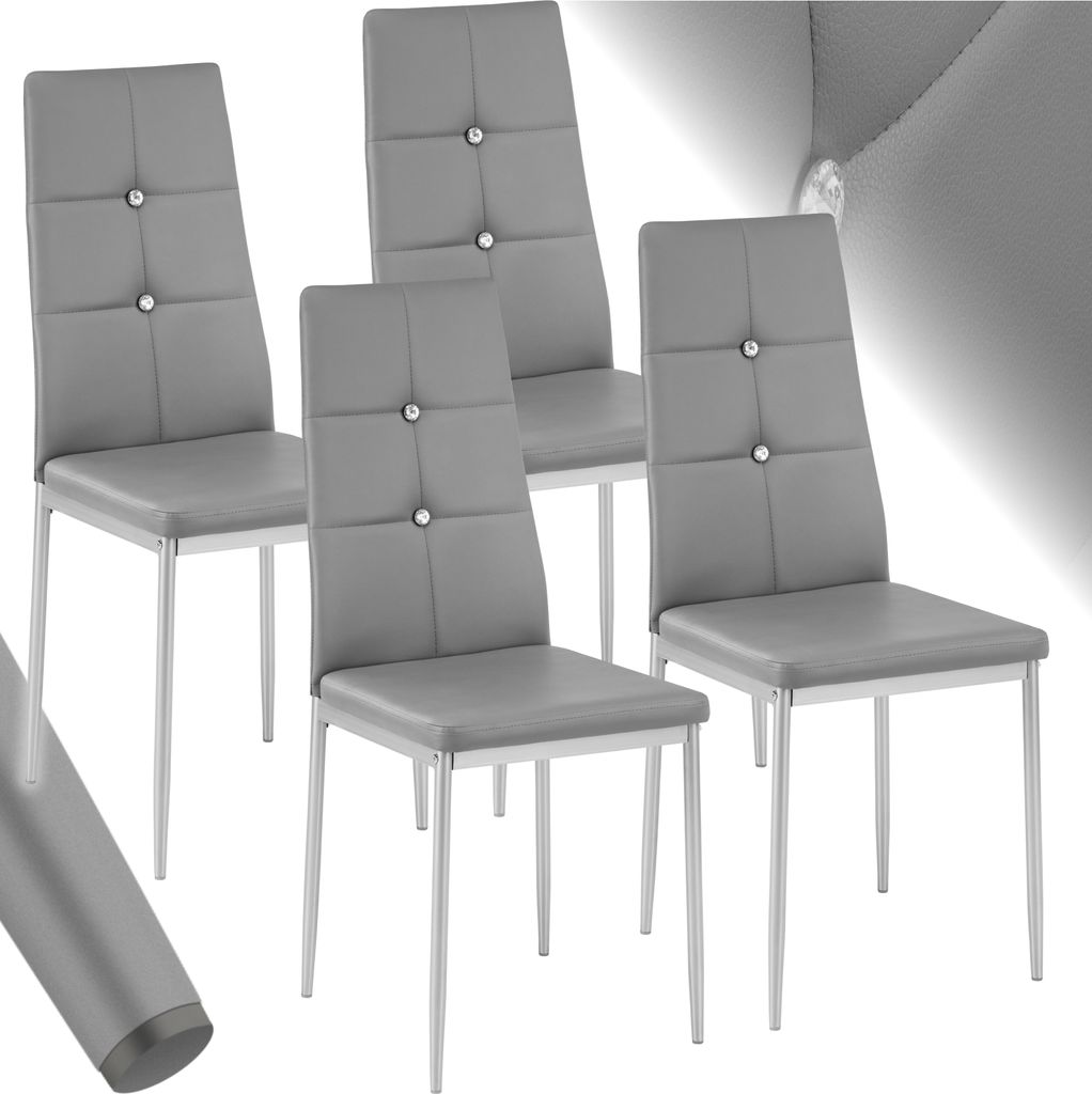 A set of four gray dining chairs with silver metal legs.