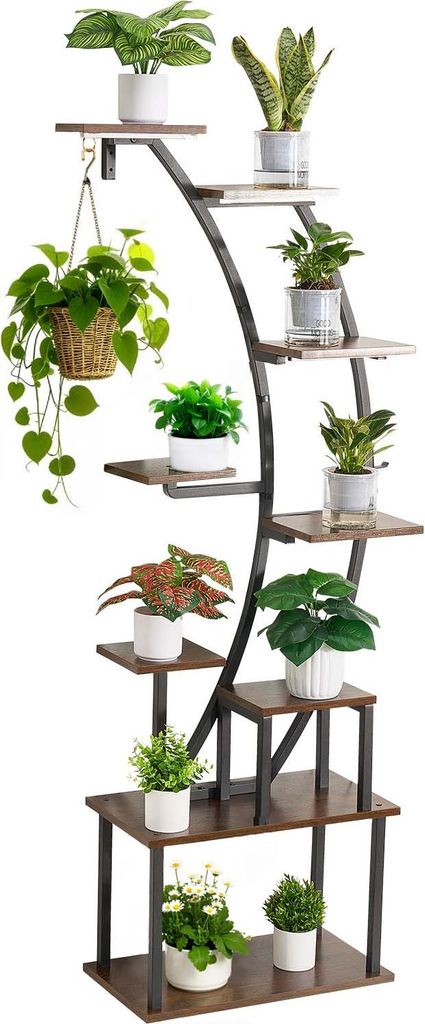 A multi-tiered plant stand with various potted plants displayed on its shelves.
