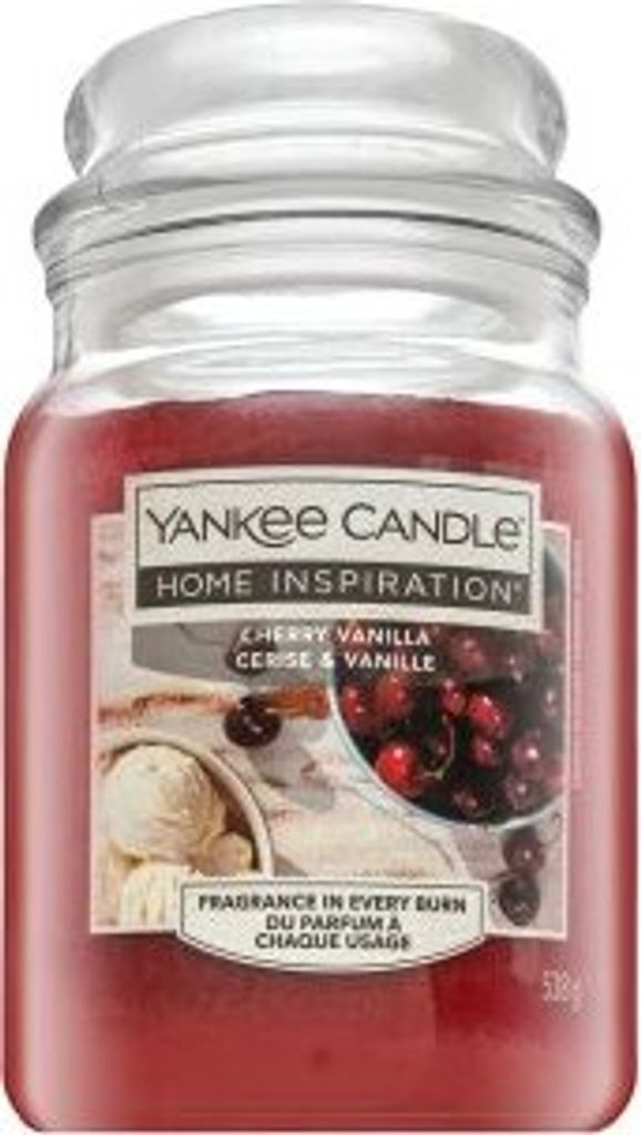 A Yankee Candle Home Inspiration Cherry Vanilla scented candle in a glass jar with a lid.